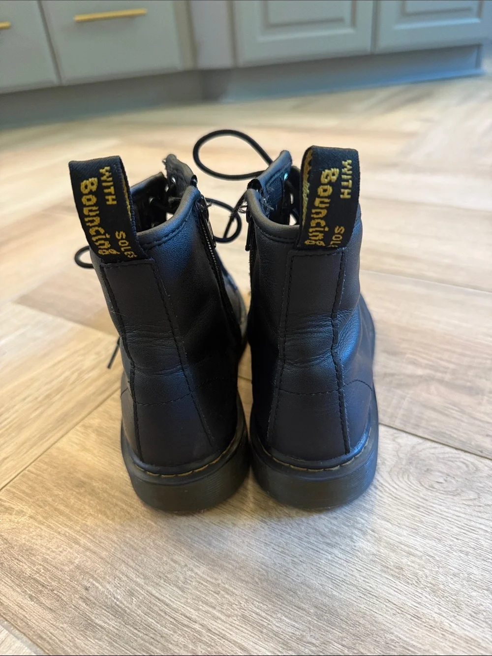 Dr. Martens Kids Black Leather Lace-Up Ankle Boots with Yellow Pull Tabs